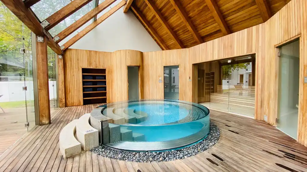 Modern indoor spa with serene lighting and architecture